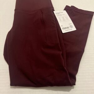 Athleta 7/8 Salutation Stash Leggings Color: Spiced Cabernet